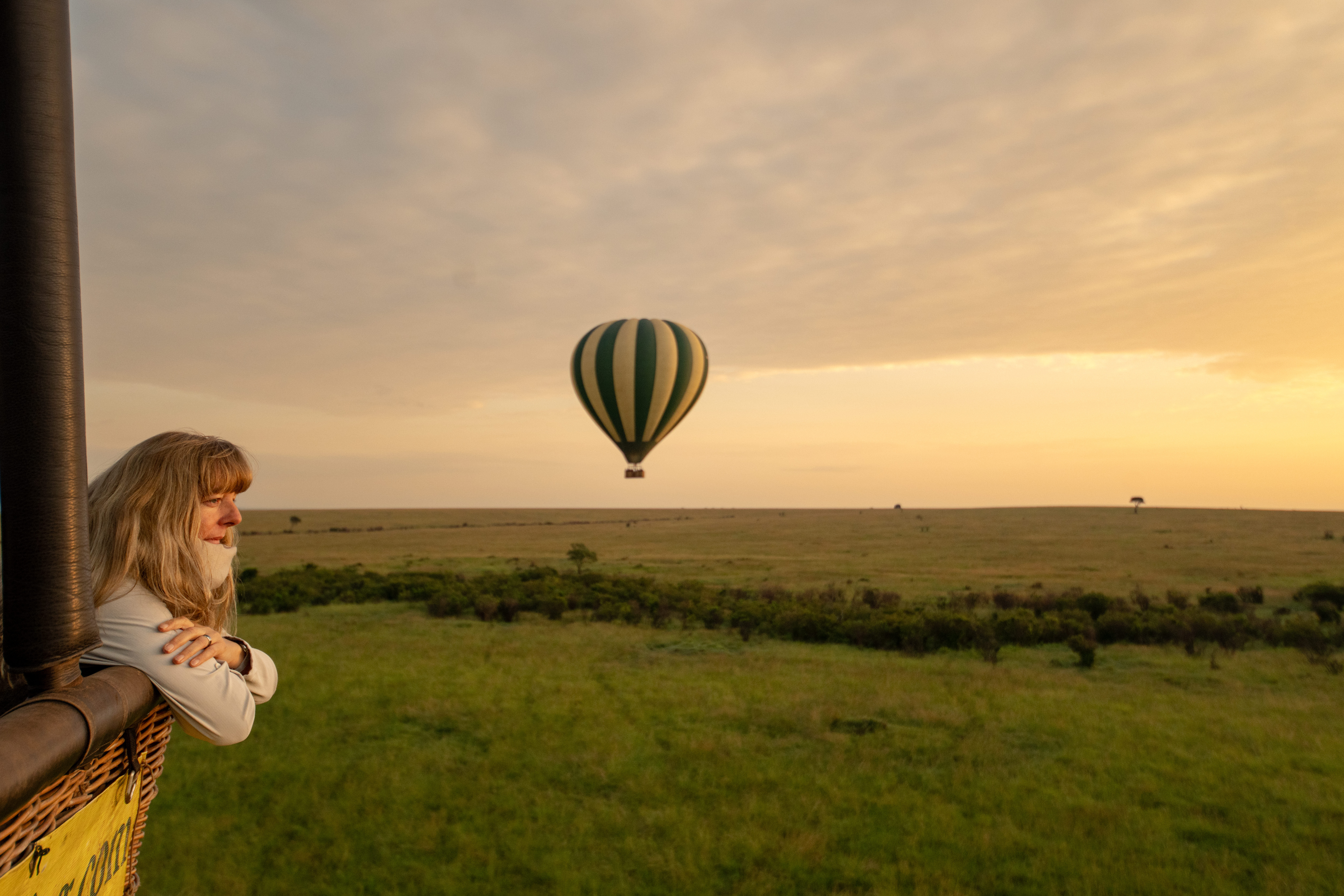 Safari specialist mapping out a combined Kenya Tanzania luxury safari itinerary across the Serengeti, Ngorongoro and Masai Mara