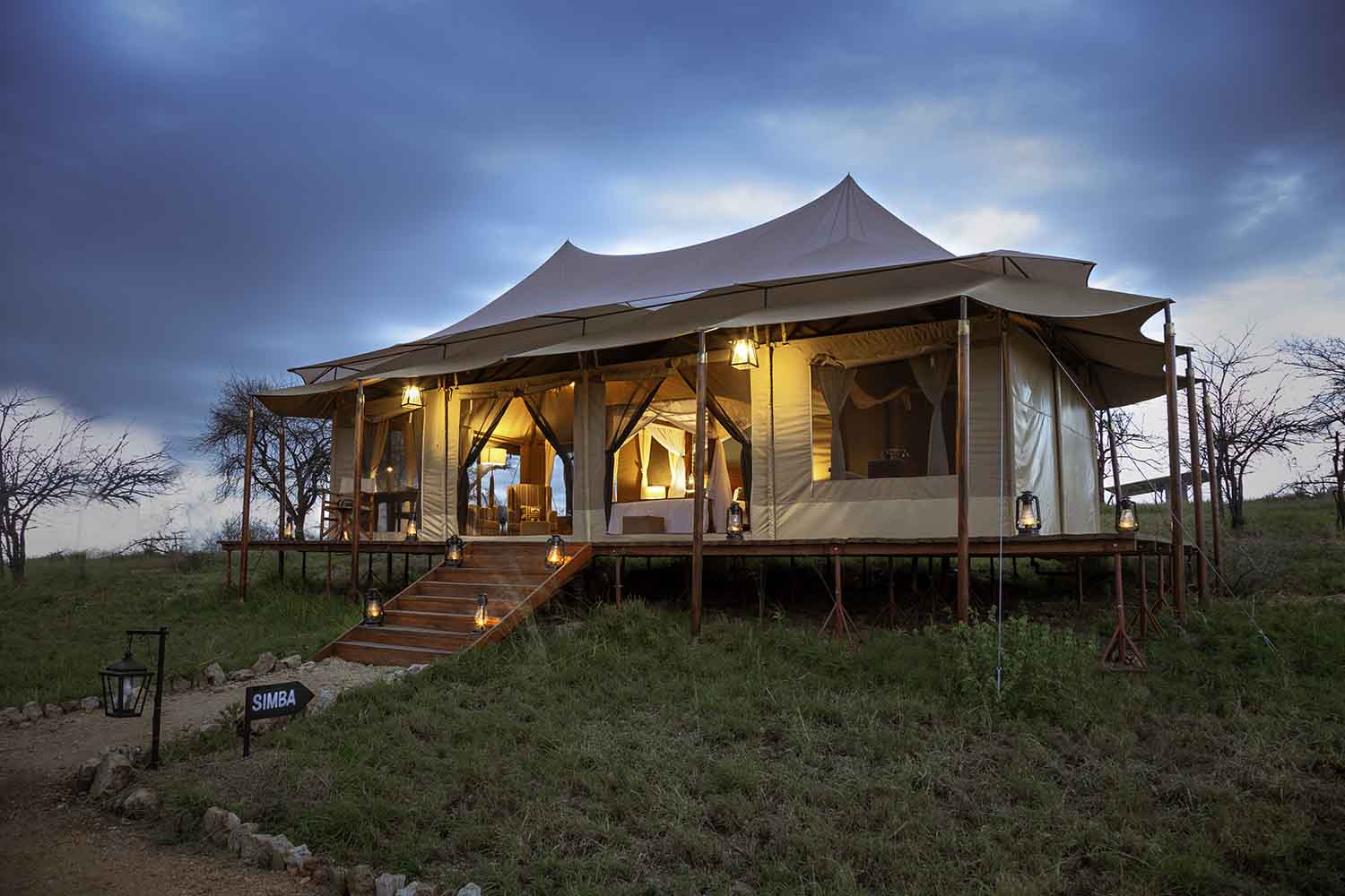 Ultra-luxury private tented suite at a premium Tanzania safari camp with plunge pool and Serengeti views, representing the top tier of safari cost per person