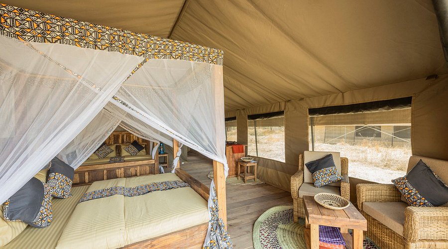 Mid-range tented safari camp in Tanzania with ensuite accommodation and comfortable furnishings at a competitive price per person